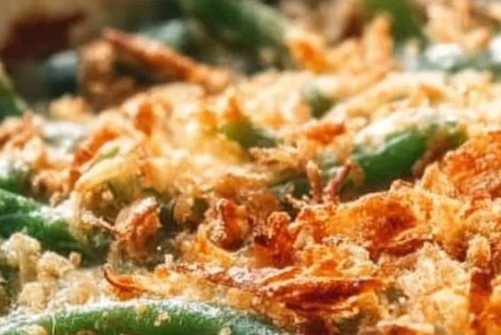 Classic green bean casserole with crunchy topping and creamy sauce